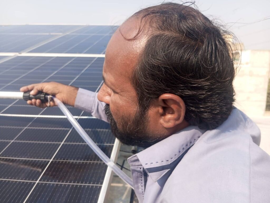 Professional solar cleaning team in Sindh