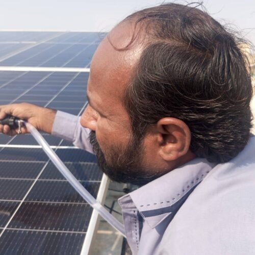 Professional solar cleaning team in Sindh